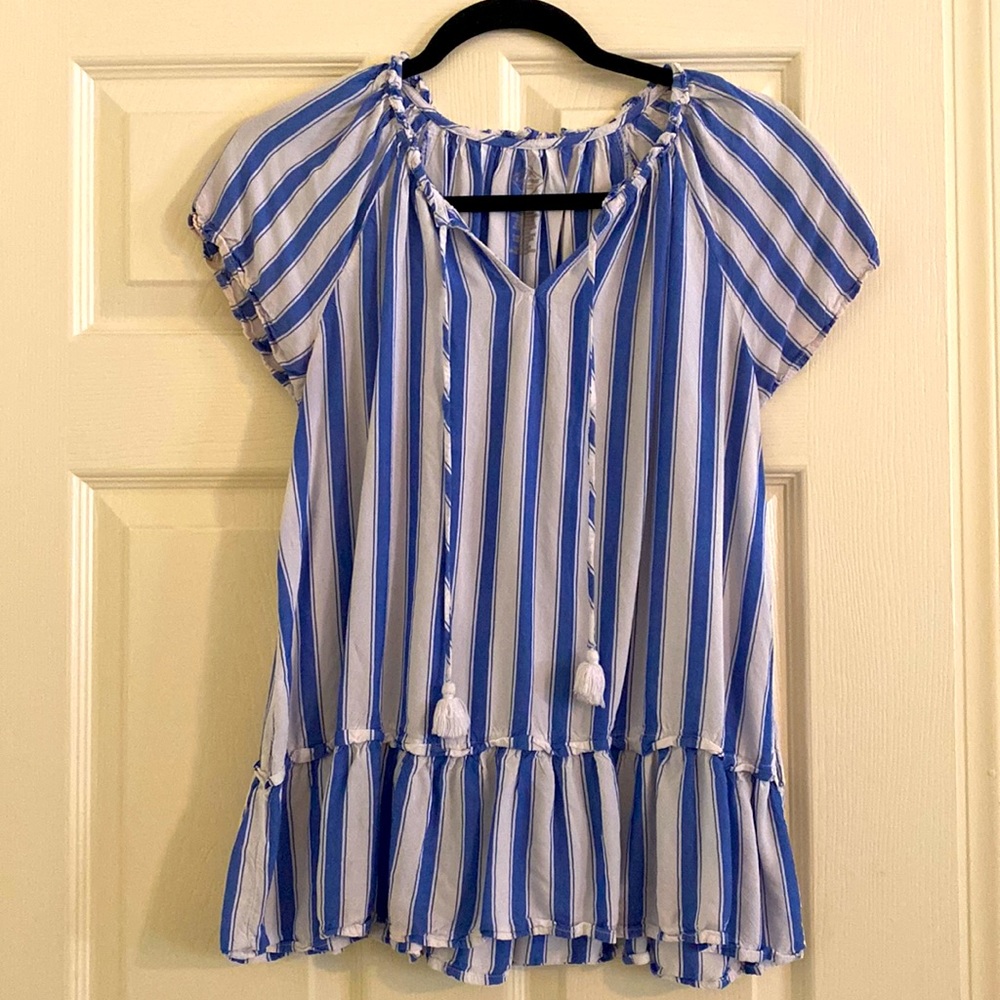 Blue and white striped blouse with tassel detail and ruffled bottom